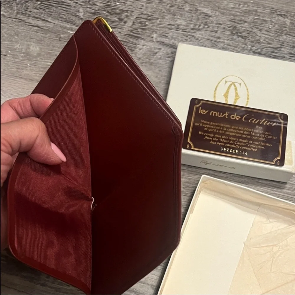 Cartier Burgundy Leather Wallet with Gold Accents